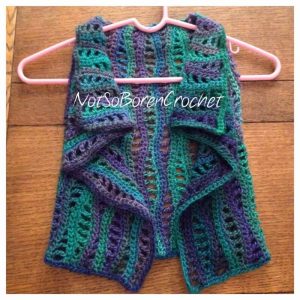Read more about the article Lacy Waves Toddler Vest Crochet Pattern